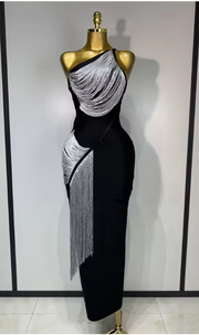 Cindy bandage dress with an asymmetric slanted collar and silver tassel fringe in a bodycon mini silhouette.