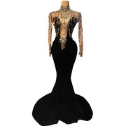 Sexy long formal prom dress made from sparkly velvet fabric. Nina luxury evening gown.