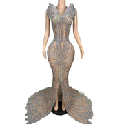 Strapless sheath fishtail prom dress with a high slit, completely covered in flashing diamonds. Kira sexy evening gown.