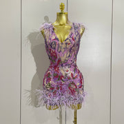 Celebrate in style with the Karina rhinestone feather embroidered bodycon dress. Elegant party dress for birthdays, cocktails, and special events.