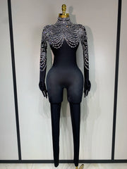 Audre luxury rhinestone stretch jumpsuit with shimmering rhinestones and fitted silhouette.