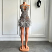 Mannequin Wearing a Luxury Crystal Halter Mini Dress with Feather Trim, Designed for Glamorous Birthday Celebrations