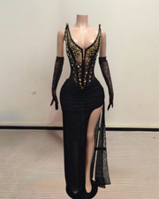 Ashanti beaded mermaid prom dress with side slit and matching gloves, featuring shimmering beadwork.