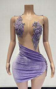 Sexy see-through sparkly beaded birthday party dress for women with sheer fabric and glam details.