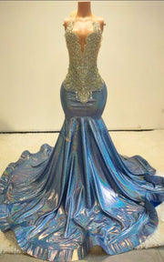 Luxury prom dress featuring deep V neckline and reflective train