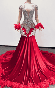 Elegant silver formal dress featuring lace appliqué and feather accents