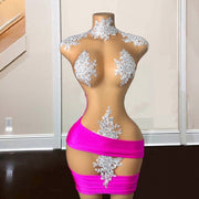 Mannequin Wearing a Hot Pink Lace Appliqué Cocktail Birthday Dress with Intricate Floral Detailing, Styled for Glamorous Celebrations
