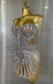 Gabrielle strapless sheer mesh mini dress featuring sparkling crystal embellishments and lace-up detailing