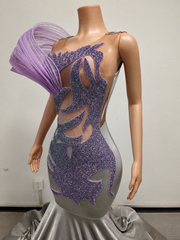 Envious Designs lavender mermaid gown with purple embellishments for prom night styling