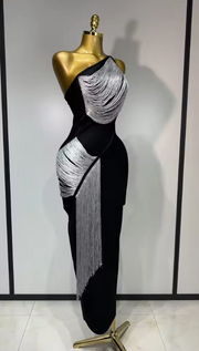 Cindy bandage dress with an asymmetric slanted collar and silver tassel fringe in a bodycon mini silhouette.