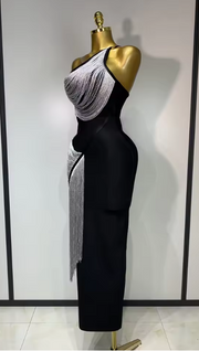 Cindy bandage dress with an asymmetric slanted collar and silver tassel fringe in a bodycon mini silhouette.