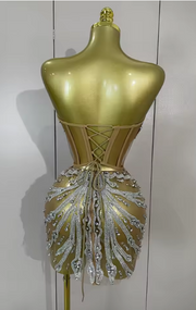 Tamara strapless see-through mini dress encrusted with shining diamonds and crystals for a luxury party look.