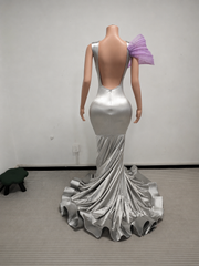 Envious Designs lavender mermaid gown with purple embellishments for prom night styling