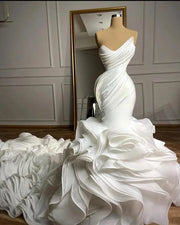 Luxurious Mermaid Strapless Ruffle Long Train Wedding Dress