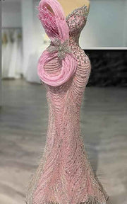 Blush Radiance Crystal Mermaid Gown With Sculptural Pink Drape And Floral Jewel Accents