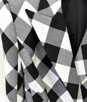 women’s blazer in black and white checkered pattern with buckle