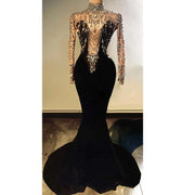Sexy long formal prom dress made from sparkly velvet fabric. Nina luxury evening gown.