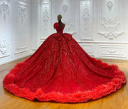 Ruby red sparkle princess gown with crystal bodice and ruffled hemline.