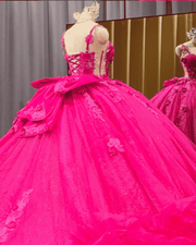 Hot pink corset bodice 3D floral ball gown quinceañera dress with sheer illusion panel and ruffle hem