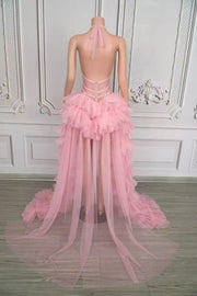 Tiana pink sheer rhinestone prom dress with deep V-neck and sparkling details.