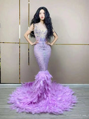 Chanel sparkly purple rhinestone feather floor-length prom dress.