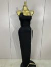 Black strapless bodycon bandage dress with sparkly diamond embellishments and tassel details for women’s party and birthday wear.