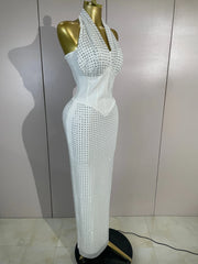 Jan halter bandage maxi dress featuring sheer mesh details and sparkling rhinestone embellishments