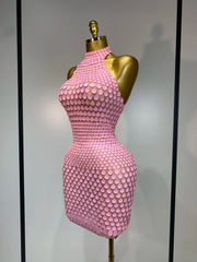 Sparkle in the Jamilla pink sequin backless mini dress. Luxury halter party dress for birthdays, singers, stage shows, and nightlife.