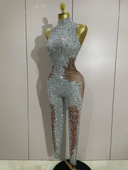 Luxury sleeveless rhinestone bodycon jumpsuit with sparkling crystals for stage or night-out wear.