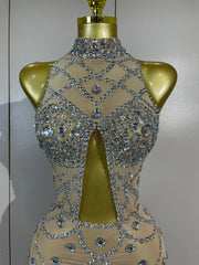Belinda crystal embellished mini dress featuring feather accents and hollow-out details for a glamorous party look