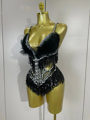 Claire rhinestone feather tassel mesh bodysuit for women. Sexy performance outfit for nightlife, dance, and stage events.