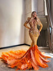 Beaded crystal feather mermaid evening dress with sparkling beadwork and elegant feather details.