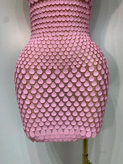Sparkle in the Jamilla pink sequin backless mini dress. Luxury halter party dress for birthdays, singers, stage shows, and nightlife.