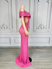 Elegant formal prom dress with sparkling rhinestones and a tasteful high split. Maya luxury evening gown.