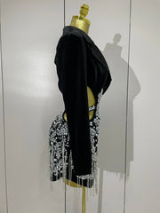 Naomi black hollow-out mini dress with diamond accents and tassels for women’s evening parties, birthdays, or stage events.