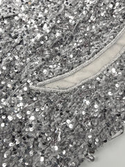 Amara one-shoulder gray sequin gown with feather details, elegant long evening dress for parties and formal occasions.