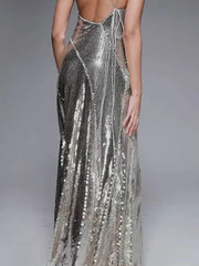 Zaria silver sequin strappy backless gown with ruffle mesh details – elegant party dress.