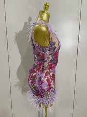Celebrate in style with the Karina rhinestone feather embroidered bodycon dress. Elegant party dress for birthdays, cocktails, and special events.