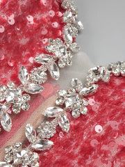 Lyra strapless backless maxi dress with diamond sequins, styled for formal events and high-glamour occasions.