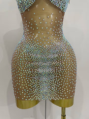 Sasha one shoulder rhinestone mesh sheer mini dress for women. Sexy party outfit for birthdays, nightlife, and stage wear.