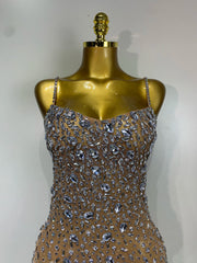 Cassandra sleeveless rhinestone bodycon mini dress for women. Sexy sparkly outfit for birthdays, nightlife, and stage wear.