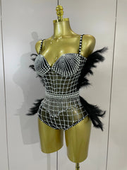 Shine in the Tabitha pearl, rhinestone, and feather mesh bodysuit. Luxury stretch outfit for stage performances, parties, and special events.
