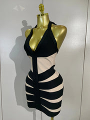 Azi sleeveless halter backless bandage mini dress with a figure-hugging bodycon silhouette