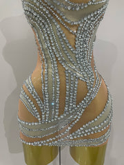 Toni crystal see through stretch mini dress for women. Sparkly party outfit for birthdays, stage wear, and nightlife events.