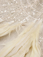 Selah nude strapless crystal embellished gown with feathers and high side slit – elegant sheath dress for homecoming, prom, and glamorous evening events.