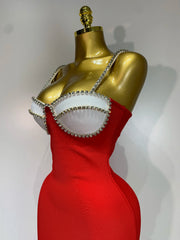 Red backless bodycon maxi dress with diamond embellishments.