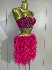 Margie two-piece party set featuring a beaded crop top and feather skirt for a glamorous statement look