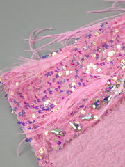 Pink floor-length sequin gown with crystal beading, feathers, and thigh-high slit – perfect for homecoming, prom, and evening parties.