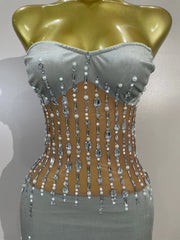 Leilani strapless sheer mesh mini dress with sparkling rhinestones and pearl chain embellishments