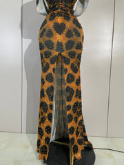 Lisa leopard print V-neck maxi dress featuring sparkling rhinestone embellishments for a glamorous evening look